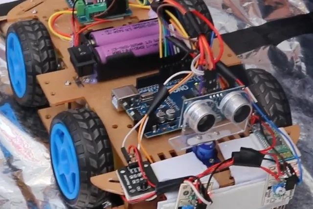 Arduino robot build with ultrasonic sensor and four wheels